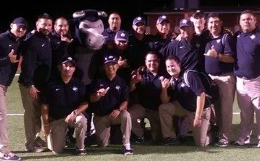 mavs coaches nixon game 2014.jpg